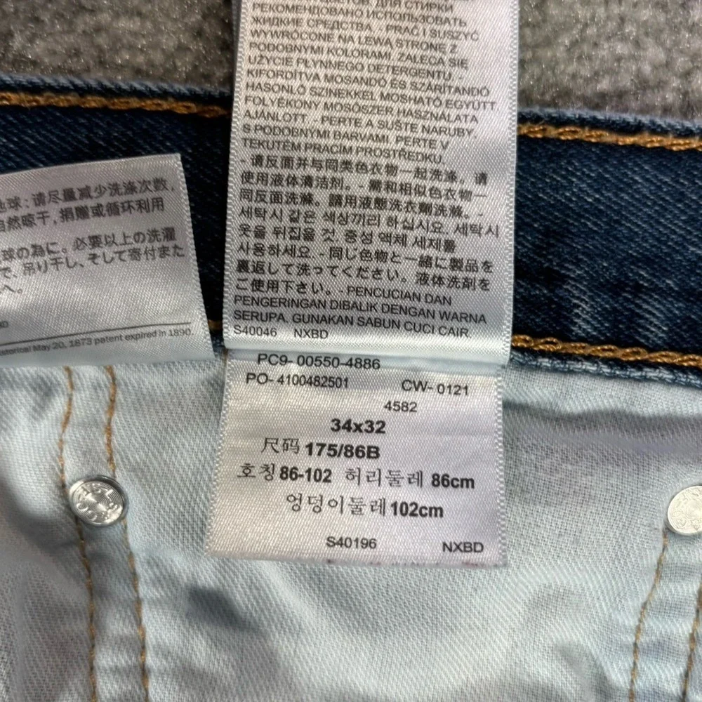 Levi's 550 Jeans Men 34x32 Relaxed Fit Tapered Medium Wash Blue Denim Cotton Dad